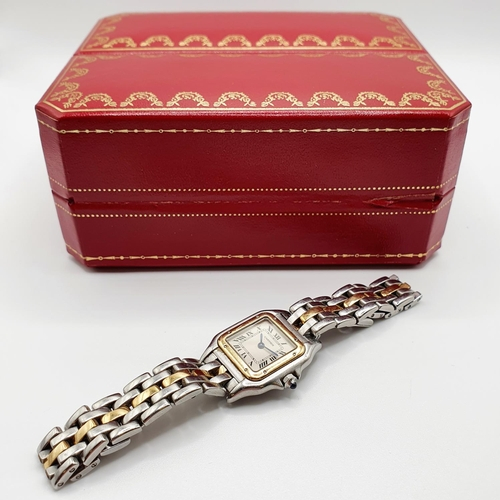 A Ladies Gold And Stainless Steel Cartier Quartz Wristwatch With Roman 