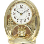 Buy RHYTHM Large Numbers Mantel Clock With Swarovski Crystal Rotating